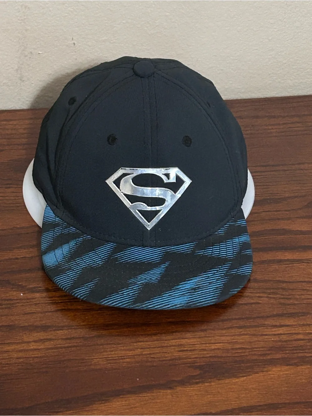 Under Armour Superman Kids Black Snapback Hat with Blue Patterned Brim